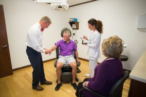 Dr. Rogers treating patient